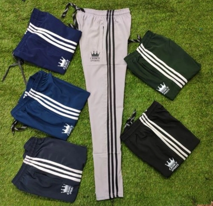 Ns multi color side strip with crown sports logo track pants size.M.L.XL. uploaded by Crown sports  on 7/26/2023