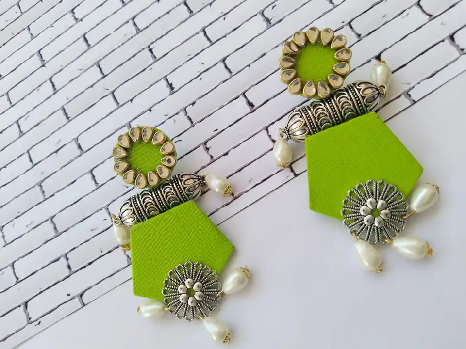 Green long earrings with pearls uploaded by The serene by Rainvas on 7/26/2023