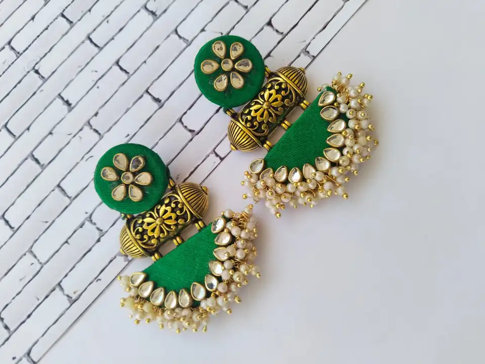 Green kundan semi circle earrings uploaded by business on 7/26/2023