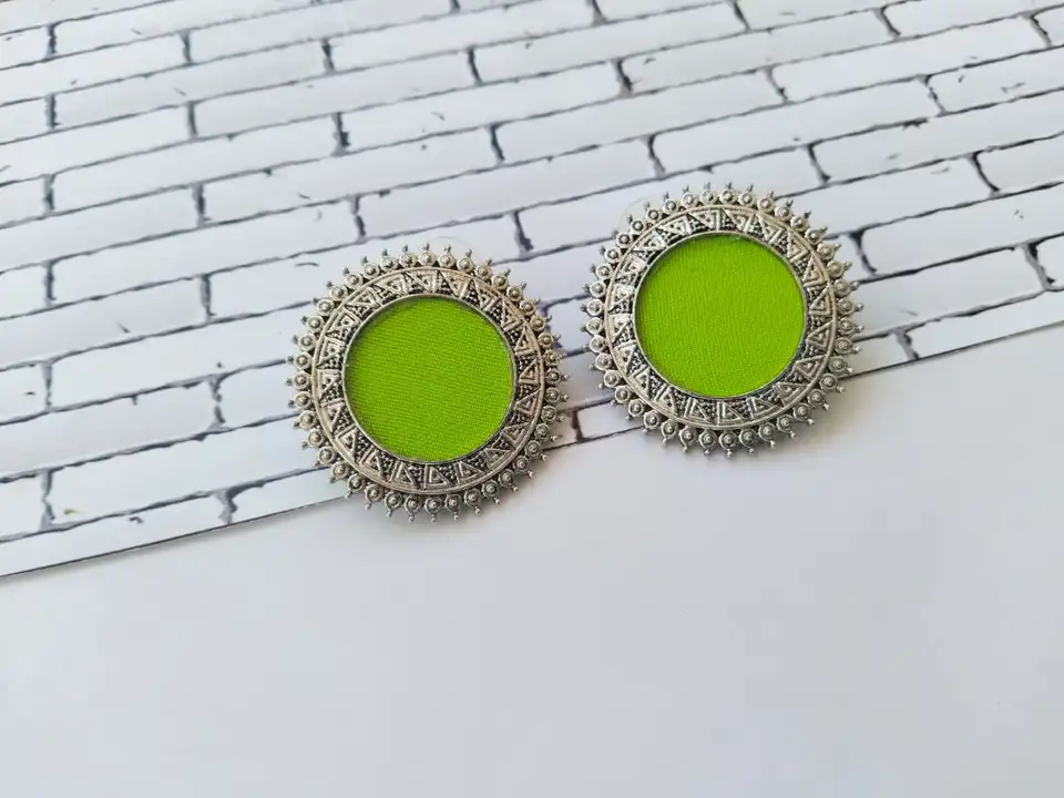 Lime and silver studs uploaded by business on 7/26/2023