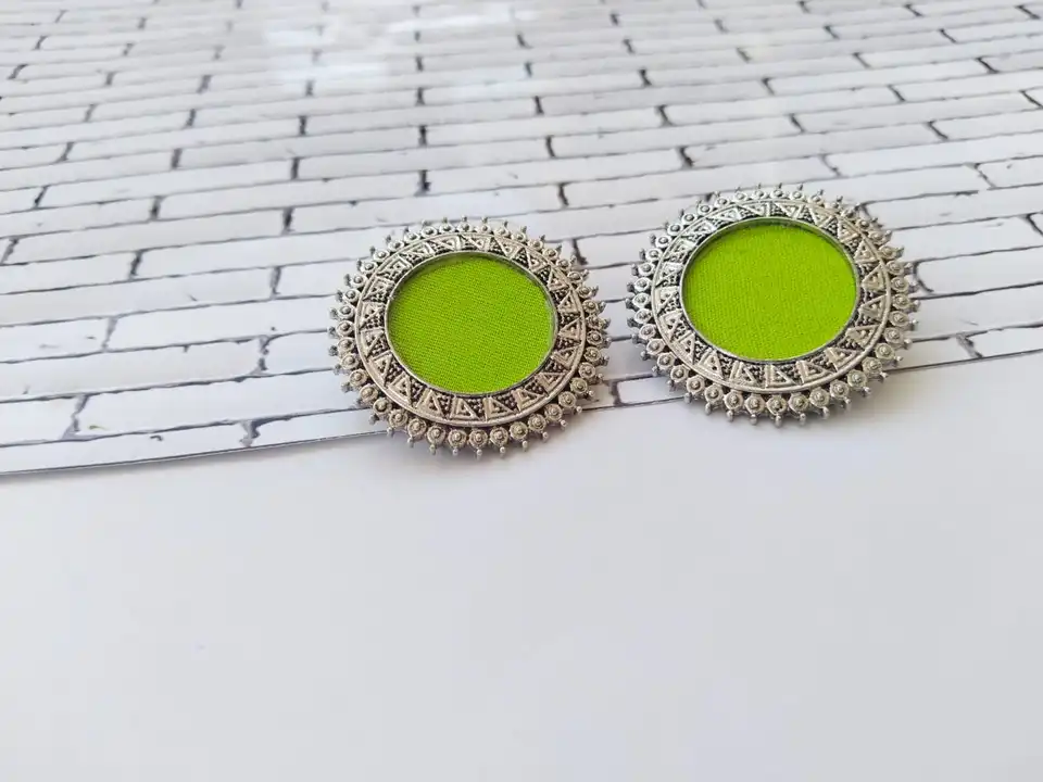 Lime and silver studs uploaded by The serene by Rainvas on 7/26/2023
