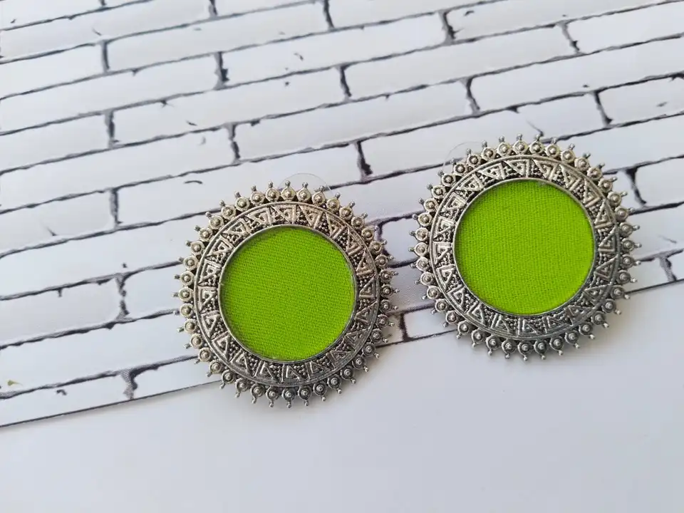 Lime and silver studs uploaded by The serene by Rainvas on 7/26/2023