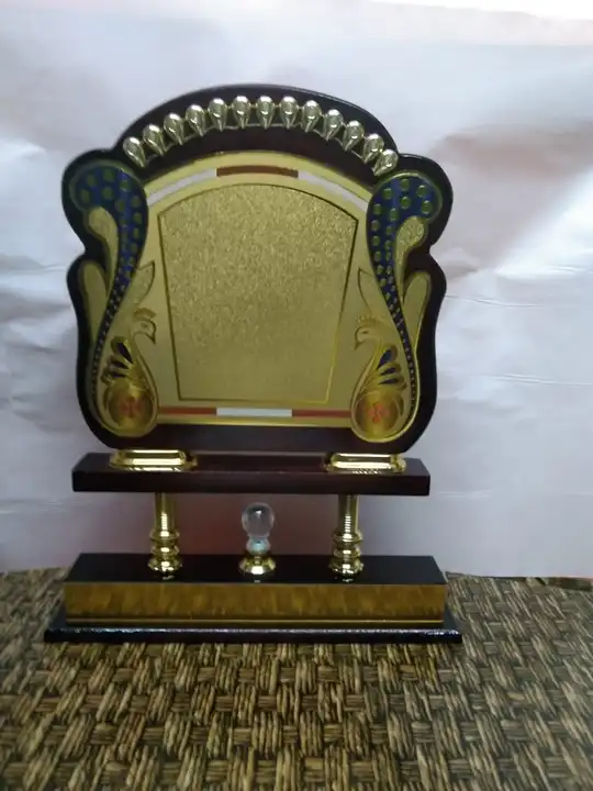 wooden trophy with piller pu finish uploaded by business on 7/28/2023