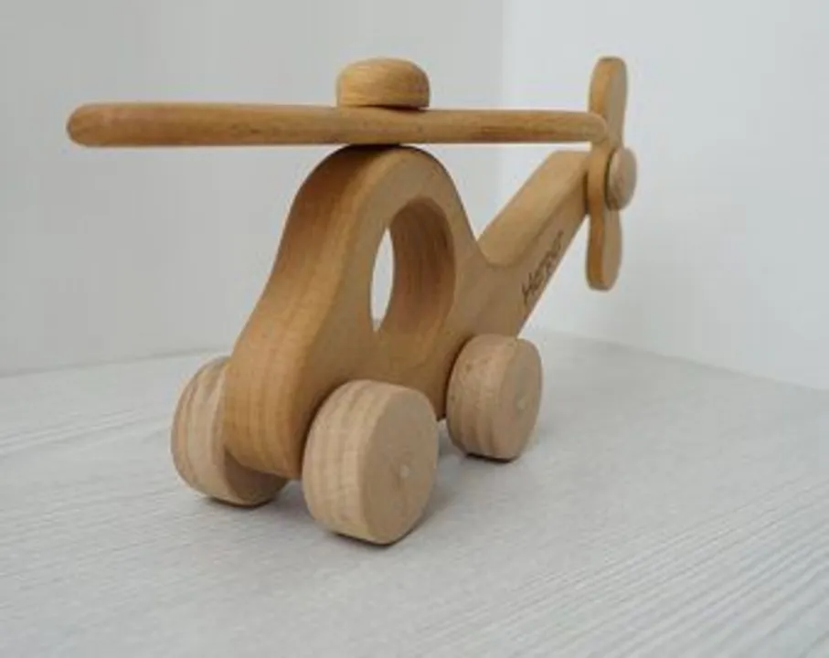 Wooden toys (helicopter) uploaded by business on 7/30/2023