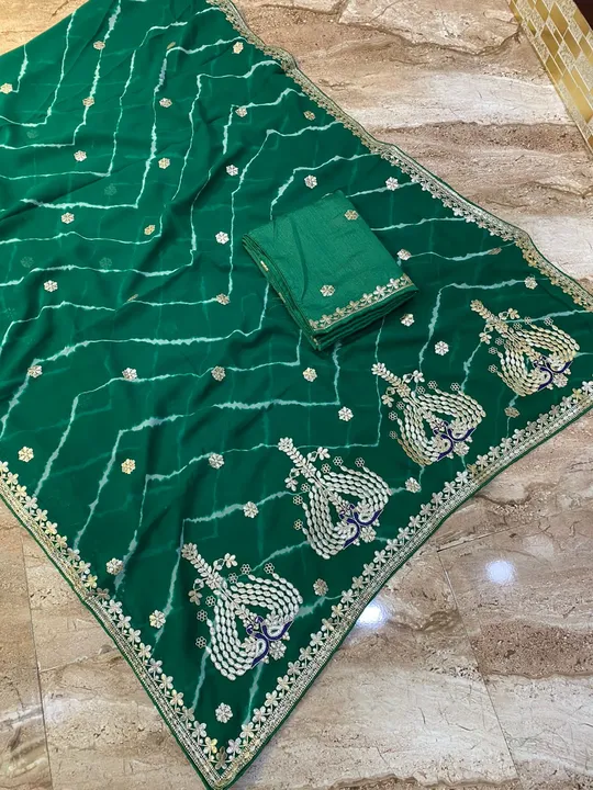 🦋Lahriya special rani or green colour 🦋 

👉jorjat home washable saree fabric 


👉 special rani g uploaded by Gotapatti manufacturer on 8/1/2023
