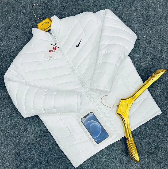 Nike fluffy jacket uploaded by business on 8/5/2023