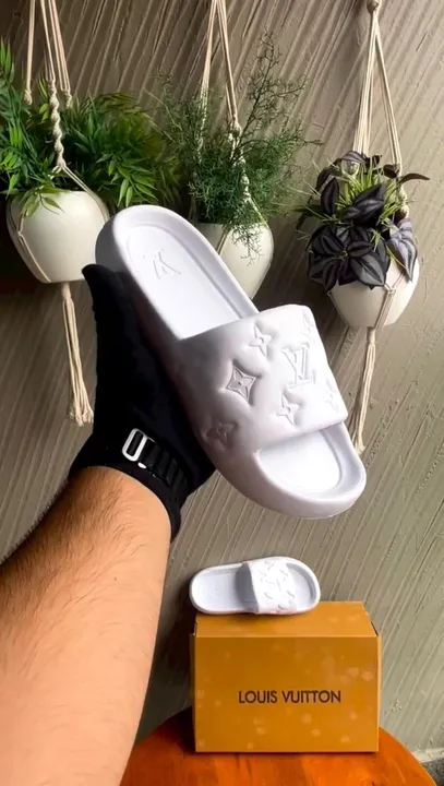 LV SLIDES IN STOCK uploaded by Trendy Time on 8/5/2023