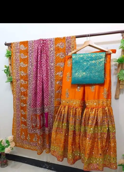 100% Original 
Pakistani Designer
Heavy Gharara 3pcs 

Dupatta:
Fabric: Pure silk
Work: 
Zari work,  uploaded by Black bird boutique on 8/5/2023