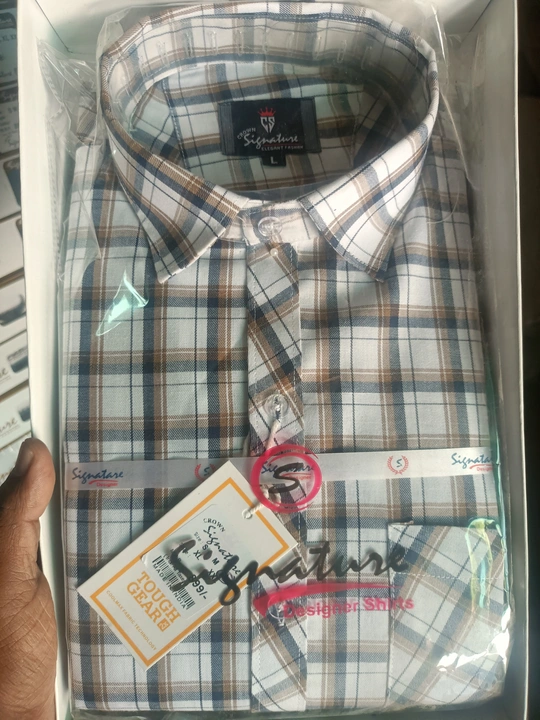 Check shirt uploaded by business on 8/5/2023