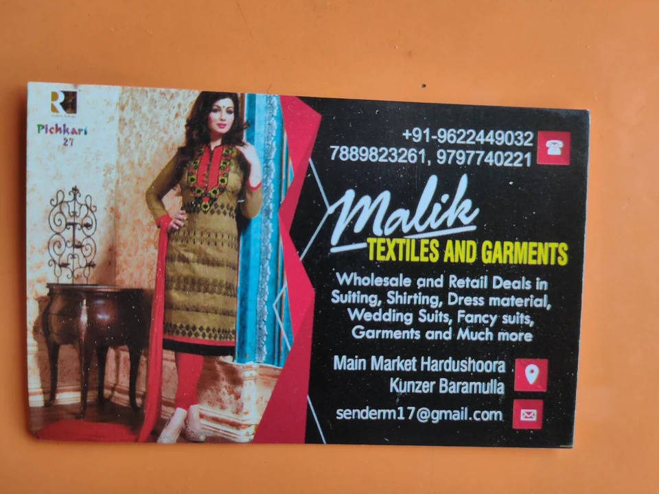 Visiting card store images of Malik Textiles and Garments