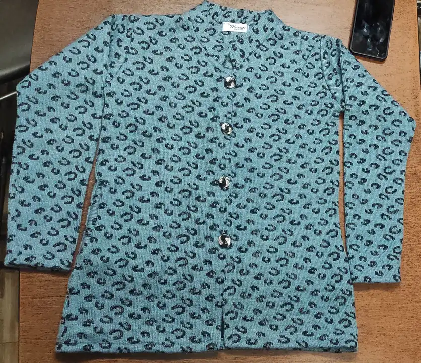 Ladies woolen cardigan sweater cheetah design uploaded by business on 8/8/2023