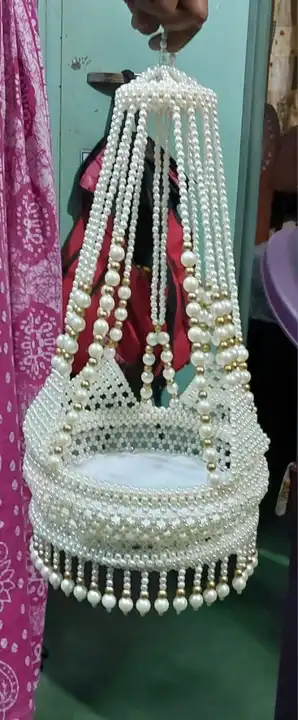 Post image *Beautiful hanging(sling) jhula in pearl*

*Size 12 inch sitting*
*Comfort up to 8 no Kanha ji*
*Heavy quality product*

*1700/-MRP*
Shipping extra
Payment mode - Paytm or Google pay
To place order watsapp back 
Product code - TS30