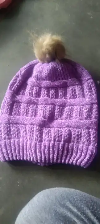 Ledies woolen cap pom pom stylish winter wear cap uploaded by SM Fashion on 8/14/2023