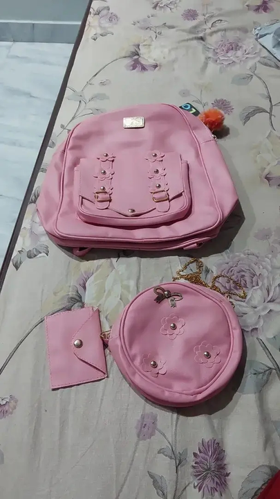 Trendy Pink PU Bags For Women-  3 Pieces Set, Backpack, Sling Bag, Clutches
 uploaded by business on 8/15/2023