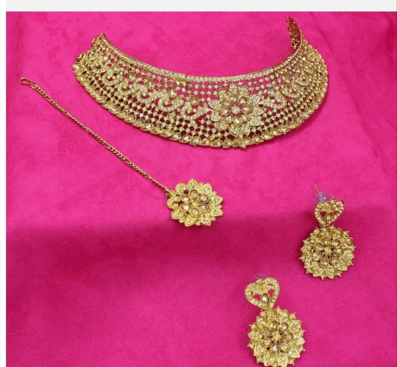Gold plated jewellery set with maang tika uploaded by Barbarika trading co. on 8/16/2023