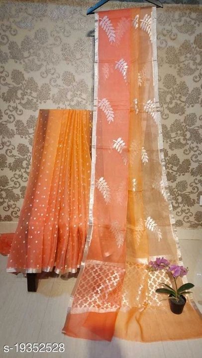 Post image Saree Fabric: Organza
Blouse: Running Blouse
Blouse Fabric: Banarasi Silk
Pattern: Woven Design
Blouse Pattern: Jacquard
Multipack: Single
Sizes: 
Free Size (Saree Length Size: 5.5 m, Blouse Length Size: 0.9 m)