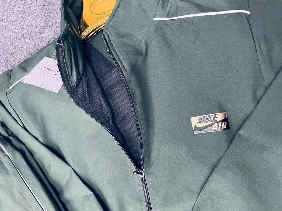 Nike jacket and treak - treaksuit, website- https://pantherstore.design.blog/..     uploaded by Panther garments - manufacturing  on 8/22/2023