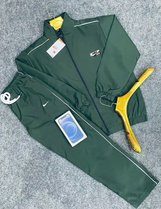 Nike jacket and treak - treaksuit, website- https://pantherstore.design.blog/..     uploaded by Panther garments - manufacturing  on 8/22/2023
