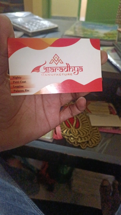 Visiting card store images of Jai maa durga textile and Aaradhya manufacturer 