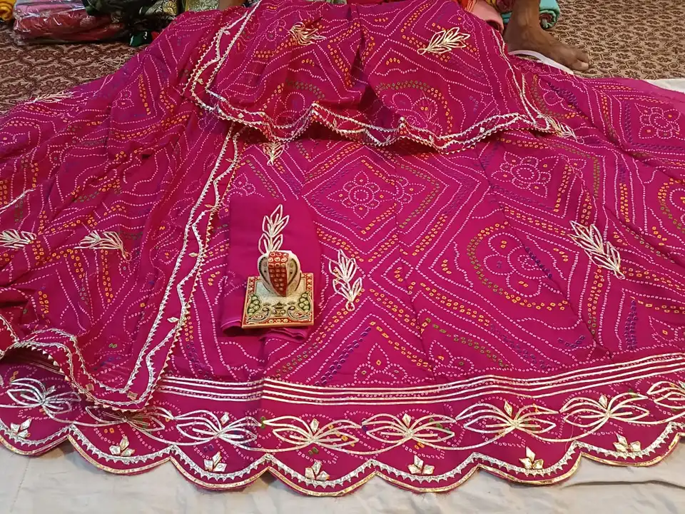 Photo of Red lehenga with contrasting pink dupatta on the head | Bridal  lehenga red, Pink bridal lehenga, Bridal lehenga collection