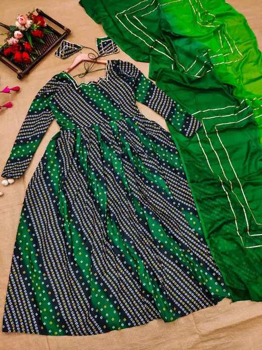Design number 475

*GREEN BANDHANI RAYON*

Colour burst impressions on a luxe fabric result in the c uploaded by Villa outfit on 8/24/2023