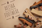 Business logo of Arisha footwear