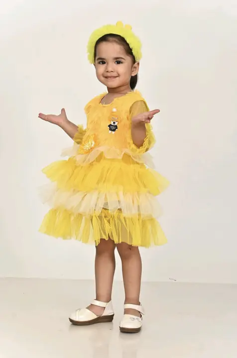 Kids girls frock- yellow colour  uploaded by business on 9/1/2023
