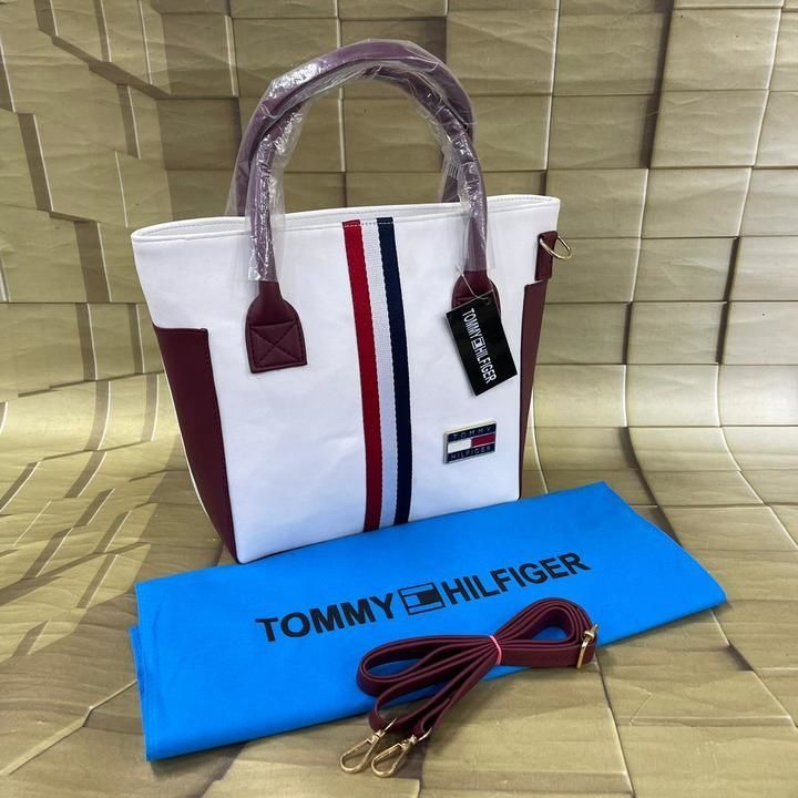 Post image Make your Everyday Stylish and colourful with us😌

*TOMMY HILFIGER*

The most elegant and suitable hand bag😀 tote bag☺️

Big size😃 Front Tommy hilfiger belt😎and also with front Logo😉
And also with tag

This bag is made for special occasion and also you can use as party wear💯

The best part about this bag has top two handles so that you can carry in your hands safely🥰

Two external compartment😊and one inside zip
There is lot’s of space in this bag🤝and also one back pocket is their for your phone safety🤨😍

And also you can carry on your shoulder easily bcoz the long belt which is adjustable and detachable provided with this bag🥰

It has metal stubborn  stud for bottom protection😌

It is Classical Like you🤨

So come on make this bag your daily life partner😃🤨

Book it Nowwww

*BEST PRICE*
₹750-/only
For more details and Price
Text me on +91966577191
https://wa.me/message/444QVC44HBVLC1
