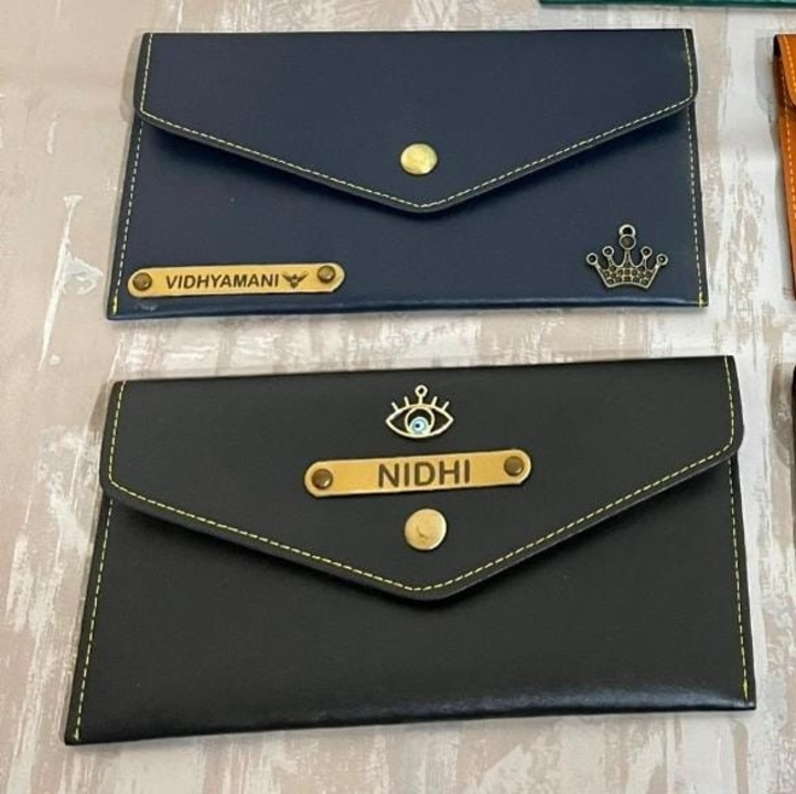 ❤️🫶🏻Customised Minimal Clutches...
With Name Engraved And A Charm...
Black Blue Red Available...
 uploaded by business on 9/5/2023