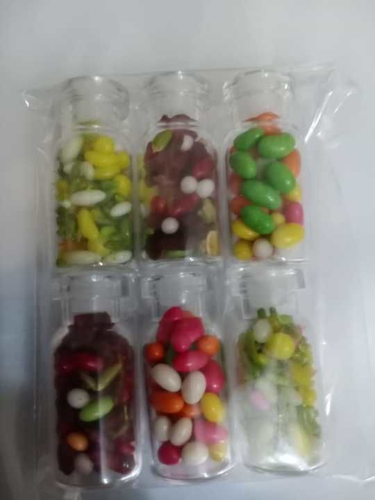 2rs sale glass bottles filled with mouthfreshners. uploaded by CHOCOLATE CREATORSS on 3/20/2021