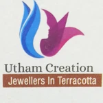 Business logo of Utham Creations