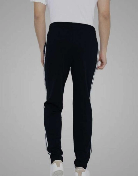 Winters wear fumma Fliz laycra side strip track pants in multi color size.M.L.XL uploaded by Crown sports  on 9/14/2023