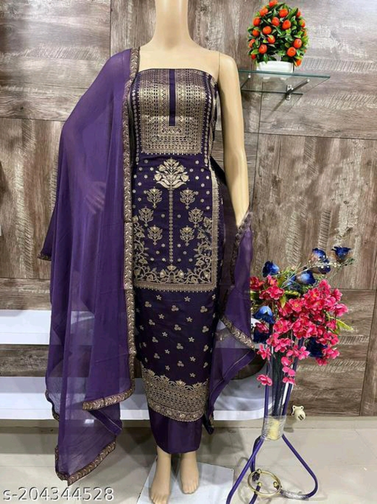SuitWomen's Purple Floral Embroidered Banarasi Silk Suits & Dress Materials
Name: Women's Purple Flo uploaded by Vs collection  on 9/20/2023