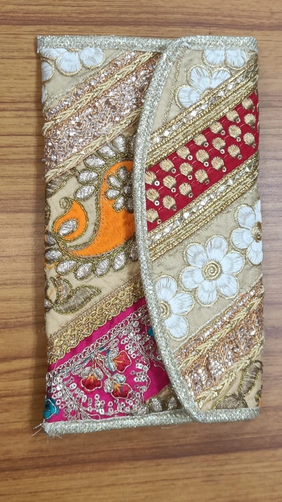 Women clutches  uploaded by Krishna collection on 9/21/2023