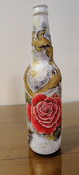 Beautiful rose sticker with smokey look black and golden glass bottle art.  uploaded by business on 7/17/2020