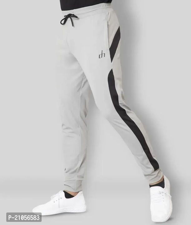 Elegant White Lycra Self Pattern Men Regular Track Pants uploaded by business on 9/28/2023