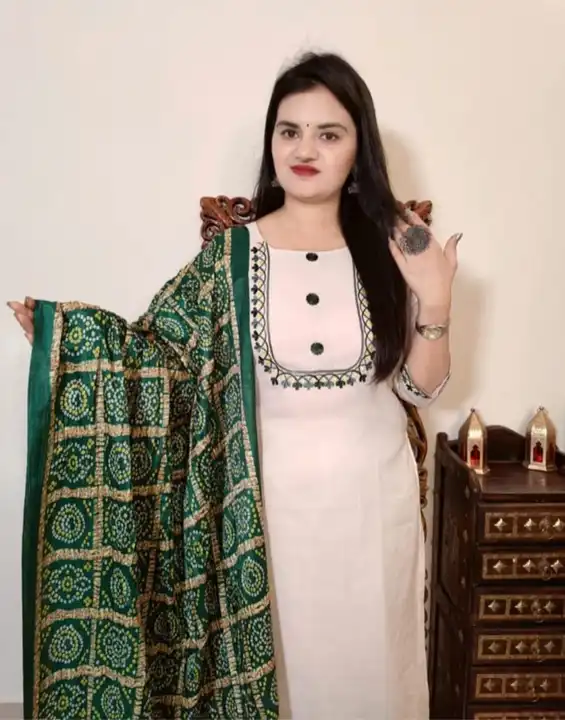 *Cotton Kurti With Pant And Bandhej Printed Silk Dupatta with Tussels. Kurti Has Embroidery Detail O uploaded by JAIPURI FASHION HUB on 10/3/2023