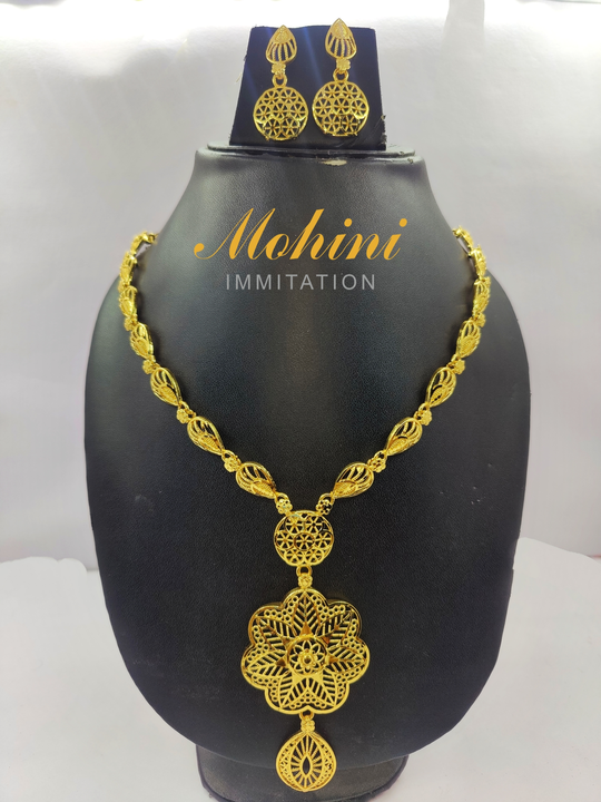 Post image mohini immitation Gold plated necklace micro test product manufacturers set for women is made of alloy. Women love jewellery; specially traditional jewellery adore a women. They wear it on different occasion. They have special importance on ring ceremony, wedding and festive time. They can also wear it on regular basics. Make your moment memorable with this range. This jewel set features a unique one of a kind traditional embellish with antic finish