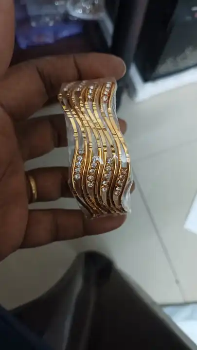 Post image Hey! Checkout my new product called
Golden bangle set.