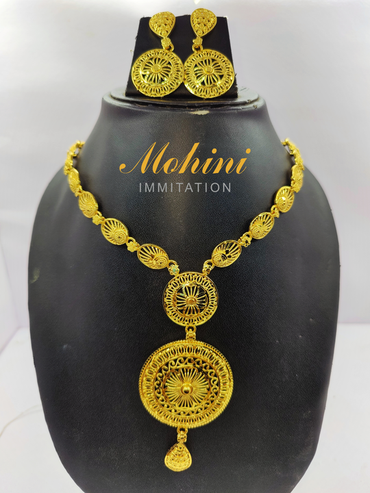 Post image mohini immitation Gold plated necklace set for women is made of alloy. Women love jewellery; specially traditional jewellery adore a women. They wear it on different occasion. They have special importance on ring ceremony, wedding and festive time. They can also wear it on regular basics. Make your moment memorable with this range. This jewel set features a unique one of a kind traditional embellish with antic finish.