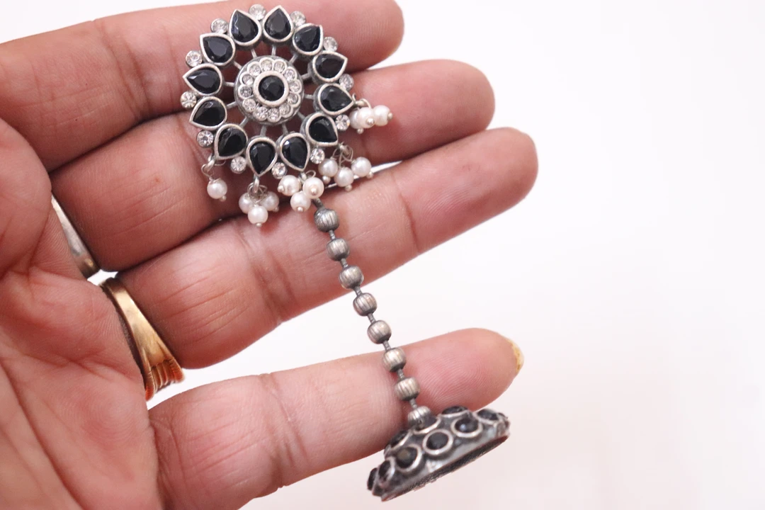 High quality OXIDIZED earrings studded with cz stones. uploaded by CULTURE on 10/6/2023