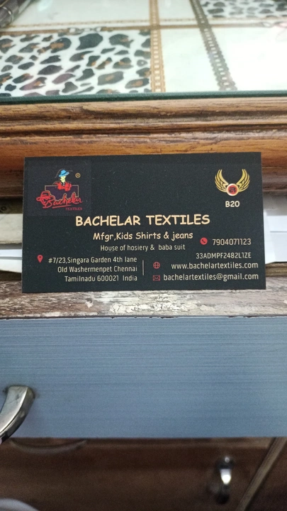Visiting card store images of Bachelar Textiles