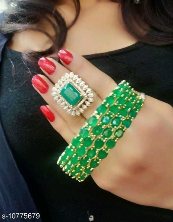 Post image Trendy Women's Bangles &amp; Ring Vol 1

Base Metal: Alloy
Plating: Gold Plated
Stone Type: American Diamond
Sizing: Adjustable
Ring size:Adjustable
Type: Bangle And Ring 
Multipack: 1
Sizes: Bangles - 2.4, 2.6, 2.8, 2.10, Ring - Adjustable (Free Size)

Price 500 rupees