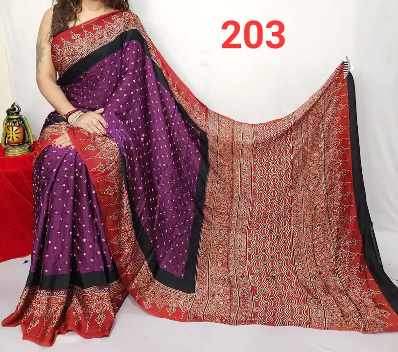 Pure modal silk ajrakh saree 

Hand block quality 

 Natural / vagitable daying quality 

also come  uploaded by business on 10/10/2023