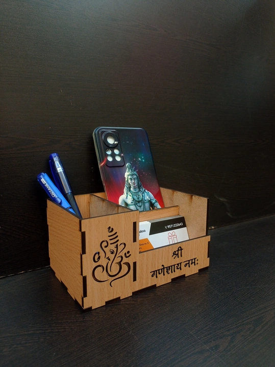 Wooden pen stand for more info contact 8949434539 uploaded by Kartikay customised gifts on 10/11/2023