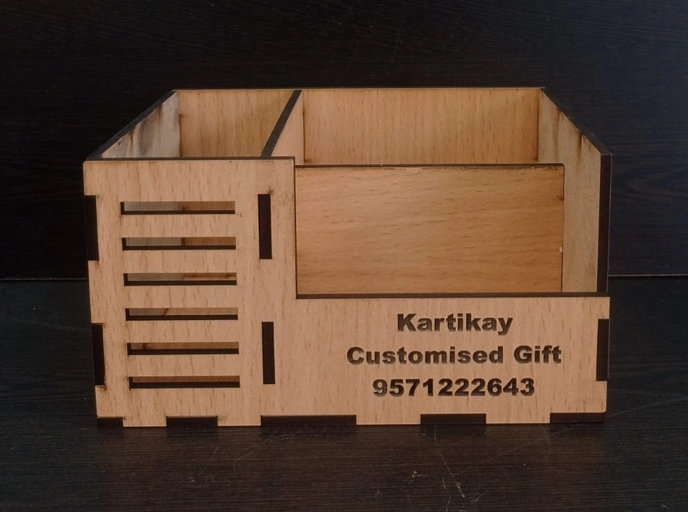 Customised pen stand wooden for more info contact 8949434539 uploaded by Kartikay customised gifts on 10/11/2023