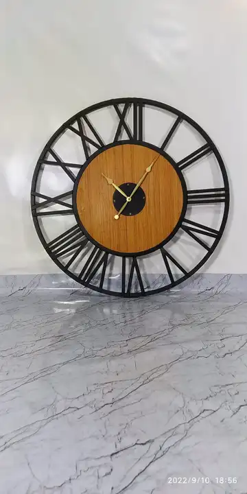 Iron wall clock uploaded by business on 10/12/2023