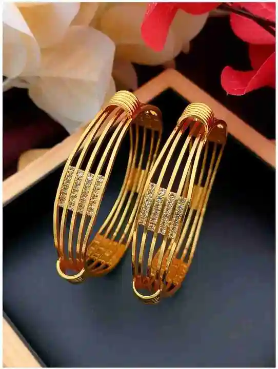 Multilayer Gold plated bangles Set of 2 uploaded by Shreem By Gehna  on 10/24/2023