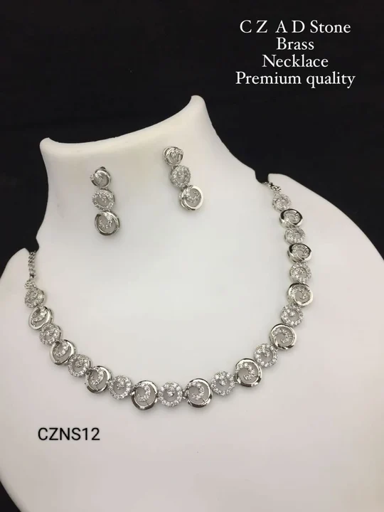 Post image Stunning Diamond AD Necklace Set With Earrings for Women &amp; Girls 

Base Metal: Brass
Plating: Rose Gold Plated
Stone Type: Cubic Zirconia/American Diamond
Type: As Per Image
Sizes: Adjustable
Net Quantity: 1Necklace &amp; 2Earrings
Country of Origin: India
Occasion:  Engagement, Birthday Gift,
Party Wear, Photography, Any Special Occasion, Ad Necklace Set, 
ad stone necklace, ad diamond necklace, ad necklace design, ad necklace set with price