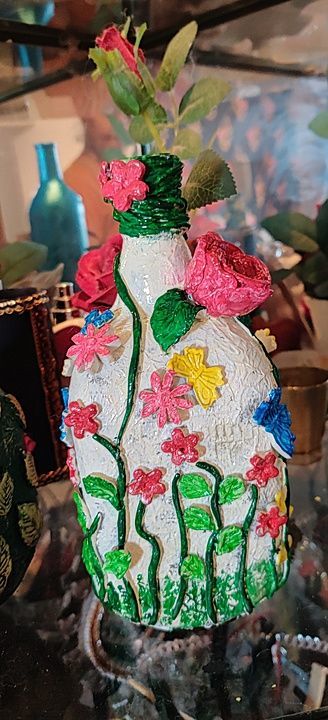 Glass bottle art. Colourful garden used by  clay and Colors  uploaded by Flawless handicrafts on 7/18/2020
